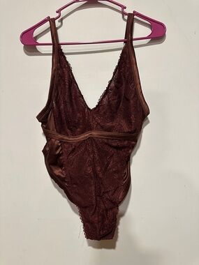 Lacey body suit.